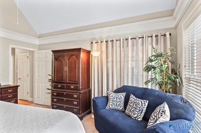 bedroom with crown molding and vaulted ceiling