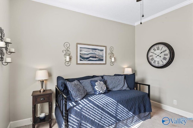 carpeted bedroom with baseboards and crown molding