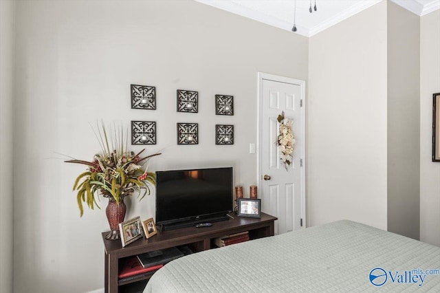 bedroom with crown molding