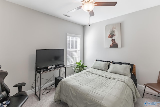 carpeted bedroom with ceiling fan