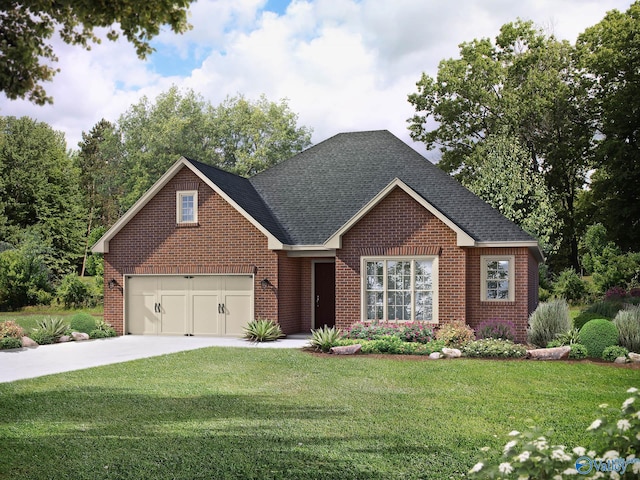 view of front of home featuring a front yard and a garage