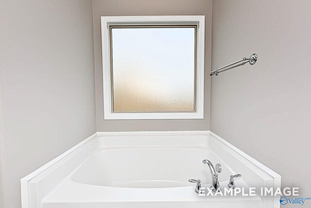 bonus room with ceiling fan, light colored carpet, and lofted ceiling