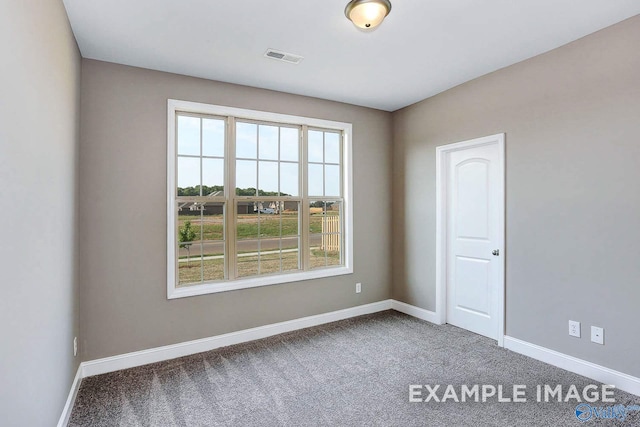 view of carpeted spare room