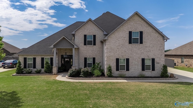 25366 Nettlebrooke Dr, Athens, AL 35613 - view of front of house featuring brick siding and a front yard