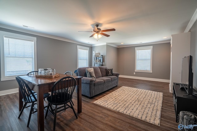 25366 Nettlebrooke Dr, Athens, AL 35613 - living area featuring visible vents, baseboards, ceiling fan, and dark wood-style floors
