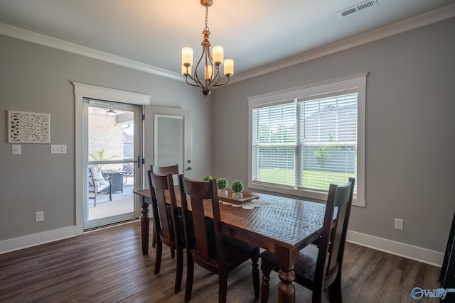 25366 Nettlebrooke Dr, Athens, AL 35613 - dining space with dark wood-style flooring, baseboards, visible vents, a chandelier, and ornamental molding
