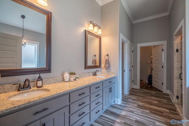 25366 Nettlebrooke Dr, Athens, AL 35613 - full bath featuring a walk in closet, double vanity, a sink, and ornamental molding