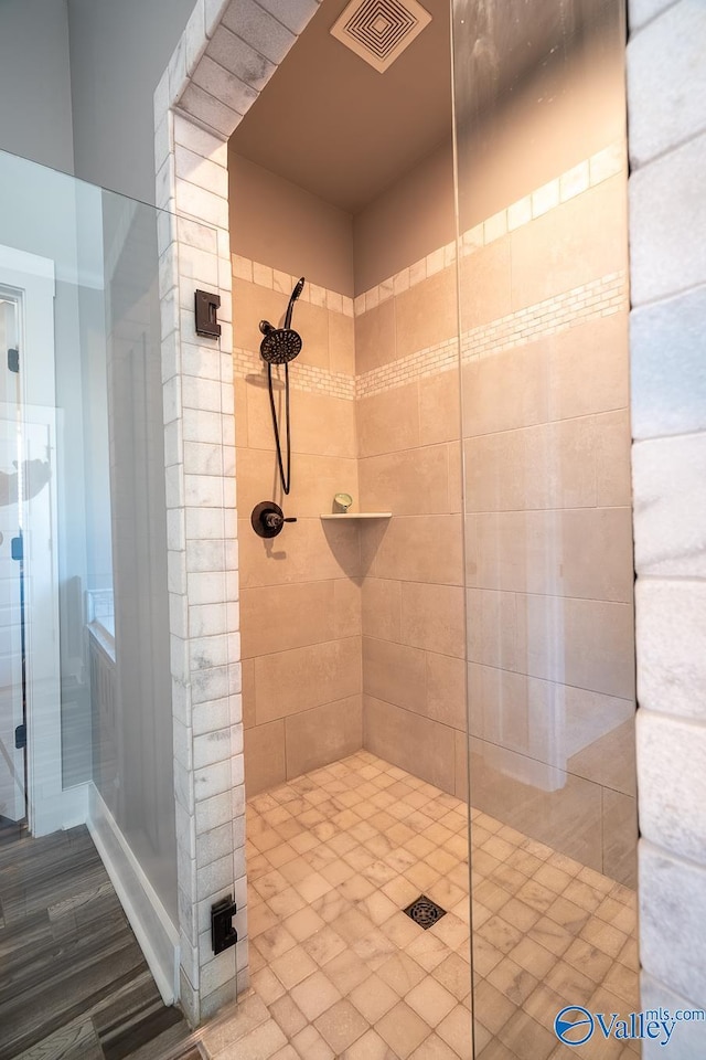25366 Nettlebrooke Dr, Athens, AL 35613 - bathroom with visible vents and tiled shower