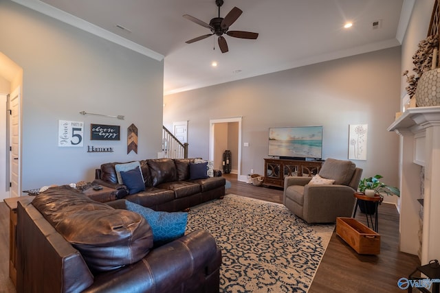 25366 Nettlebrooke Dr, Athens, AL 35613 - living room featuring a ceiling fan, stairs, wood finished floors, a high ceiling, and visible vents