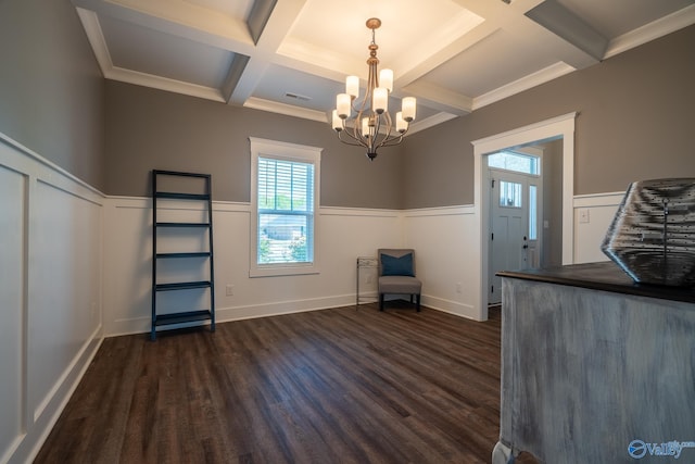 25366 Nettlebrooke Dr, Athens, AL 35613 - interior space featuring dark wood finished floors, an inviting chandelier, wainscoting, and coffered ceiling