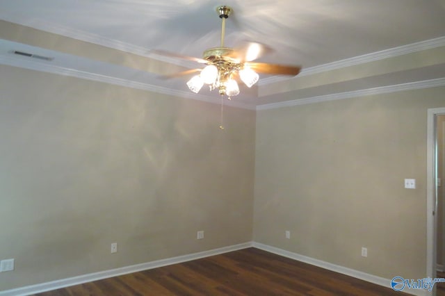 empty room with ceiling fan, crown molding, and dark wood-type flooring