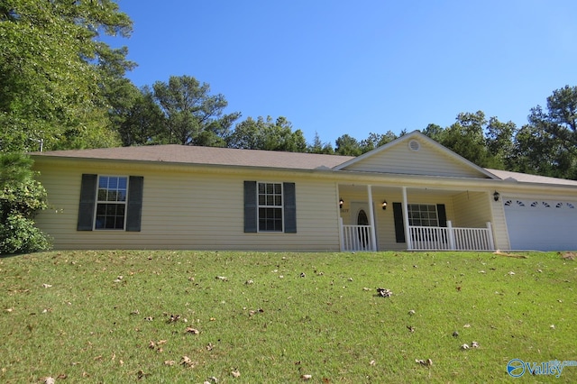 ranch-style house with a garage, a porch, and a front lawn