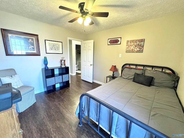 bedroom featuring ceiling fan, dark hardwood / wood-style flooring, and a textured ceiling