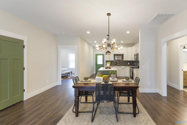 dining room with dark wood-type flooring