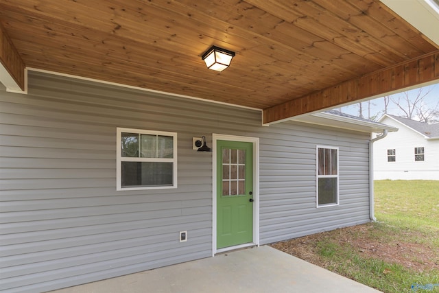 property entrance with a patio area