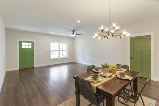 unfurnished dining area featuring ceiling fan and dark hardwood / wood-style flooring