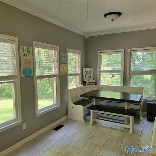 2340 Pine Lake Trl, Arab, AL 35016 - dining room with a healthy amount of sunlight, crown molding, and light wood-type flooring