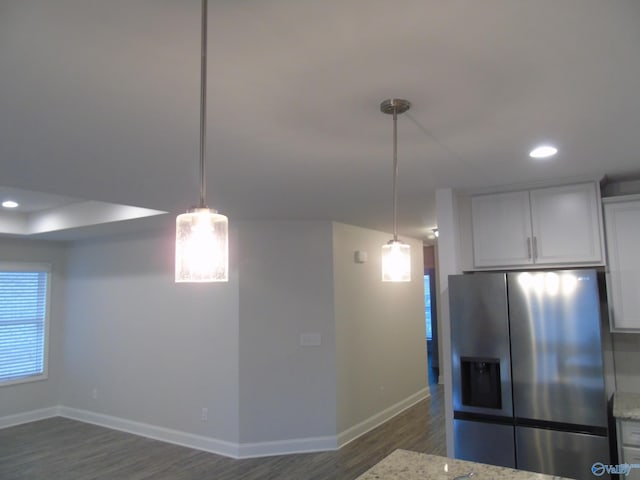 kitchen featuring recessed lighting, baseboards, stainless steel refrigerator with ice dispenser, and dark wood-style flooring