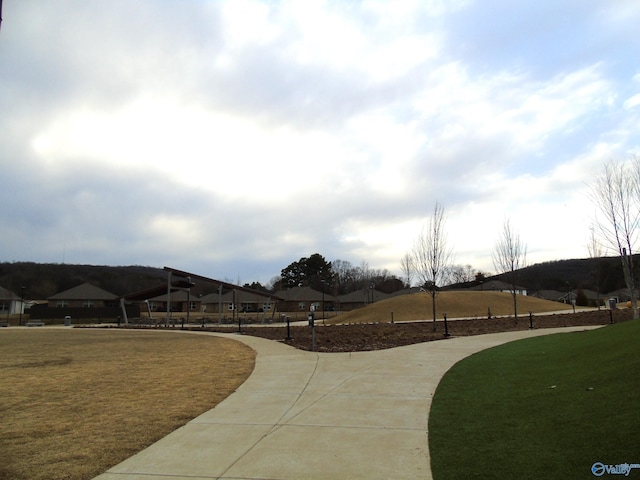 view of community featuring a yard