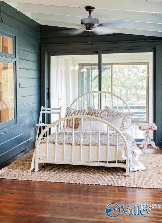 unfurnished bedroom featuring dark hardwood / wood-style floors