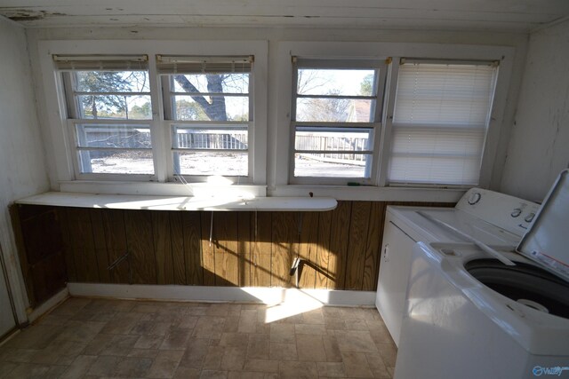 washroom with washer / dryer and laundry area