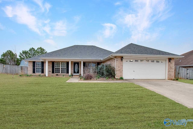 single story home featuring brick siding, an attached garage, a front yard, fence, and driveway