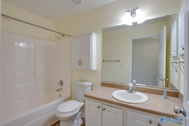 bathroom featuring toilet, washtub / shower combination, vanity, and visible vents