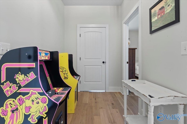 playroom with light wood-style flooring
