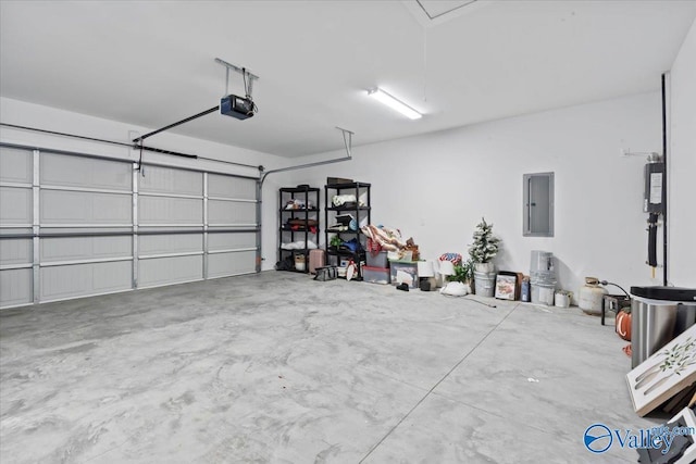 garage featuring electric panel and a garage door opener