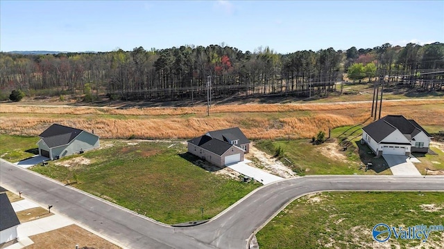 aerial view featuring a view of trees