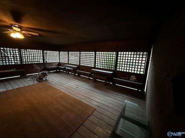 wooden terrace featuring ceiling fan