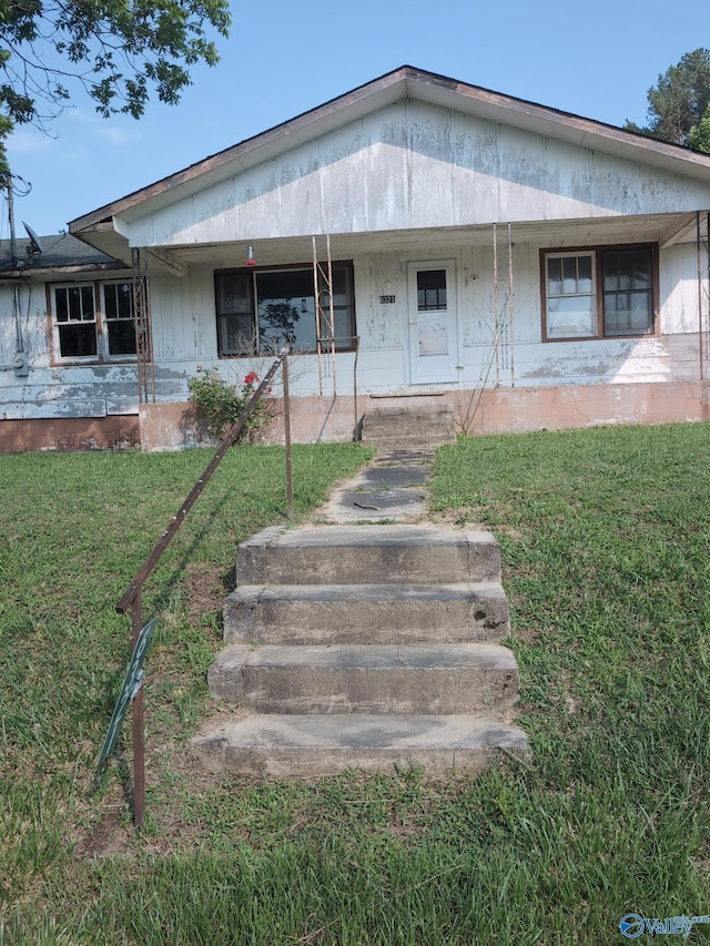 6321 Willow Rd, Ider, AL 35981 - view of front of house with a porch and a front lawn
