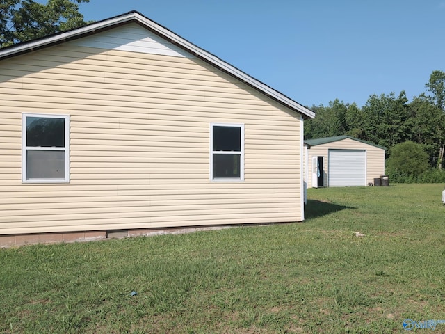 6321 Willow Rd, Ider, AL 35981 - view of side of property with a yard and an outdoor structure