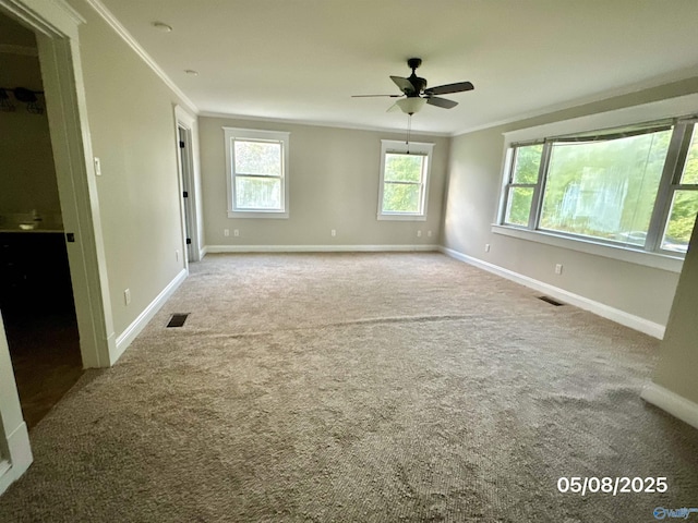 2494 Hines St S, Athens, AL 35611 - unfurnished room featuring ornamental molding, a ceiling fan, carpet flooring, and baseboards