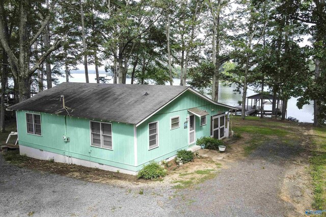 1700 County Road 102, Cedar Bluff, AL 35959 - view of side of property with roof with shingles, crawl space, and dirt driveway
