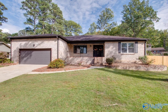 ranch-style home with brick siding, a front yard, fence, a garage, and driveway