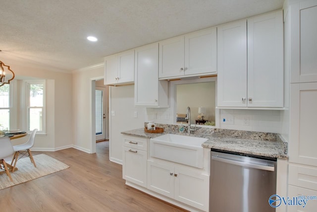 15011 Glory Dr SE, Huntsville, AL 35803 - kitchen with dishwasher, white cabinetry, a sink, and light wood-style floors