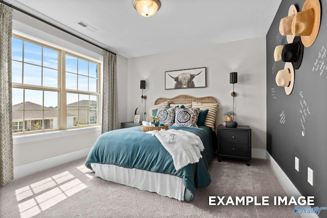 120 Burdine St, New Market, AL 35761 - carpeted bedroom with visible vents, baseboards, and multiple windows