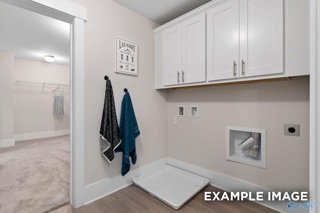 120 Burdine St, New Market, AL 35761 - laundry area featuring hookup for an electric dryer, hookup for a washing machine, cabinet space, and baseboards