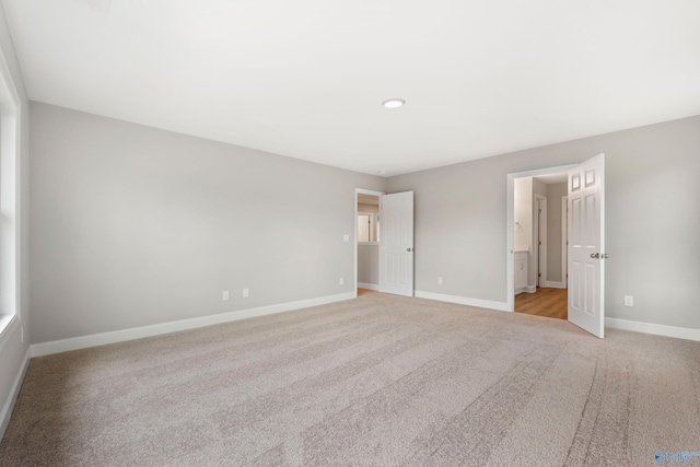 120 Burdine St, New Market, AL 35761 - unfurnished bedroom featuring light colored carpet and baseboards