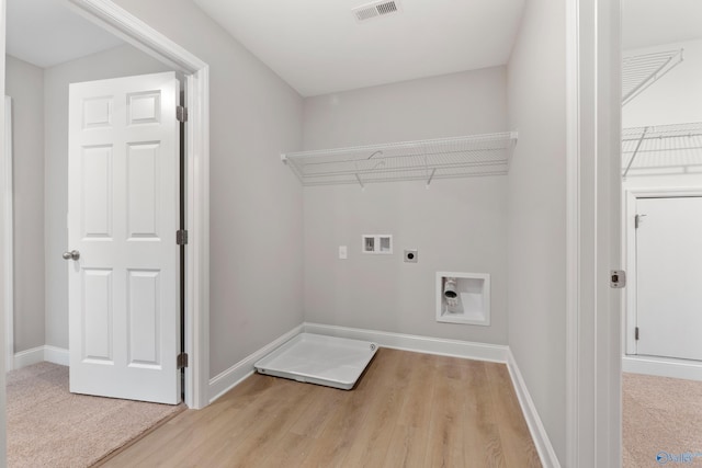 120 Burdine St, New Market, AL 35761 - clothes washing area featuring hookup for an electric dryer, light wood-style floors, laundry area, hookup for a washing machine, and visible vents