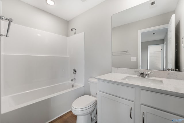 120 Burdine St, New Market, AL 35761 - full bathroom with visible vents, toilet, shower / bathing tub combination, wood finished floors, and vanity