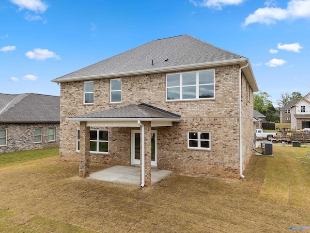 120 Burdine St, New Market, AL 35761 - back of property with a yard, a patio area, central air condition unit, and brick siding
