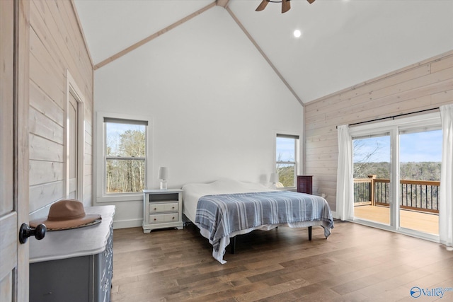 bedroom with access to outside, high vaulted ceiling, ceiling fan, and dark hardwood / wood-style flooring