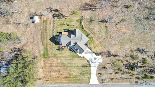 birds eye view of property featuring a rural view