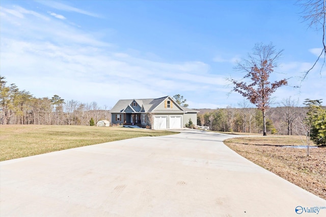 view of front of home featuring a garage and a front yard