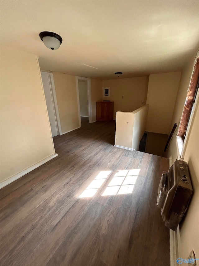 empty room with dark hardwood / wood-style floors