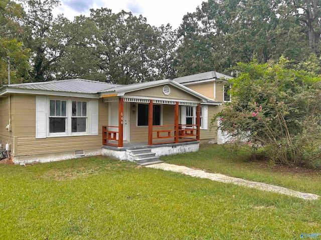 view of front facade with a porch and a front yard