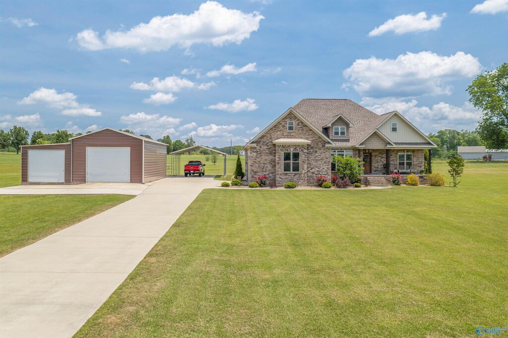 craftsman-style home with a garage and a front yard