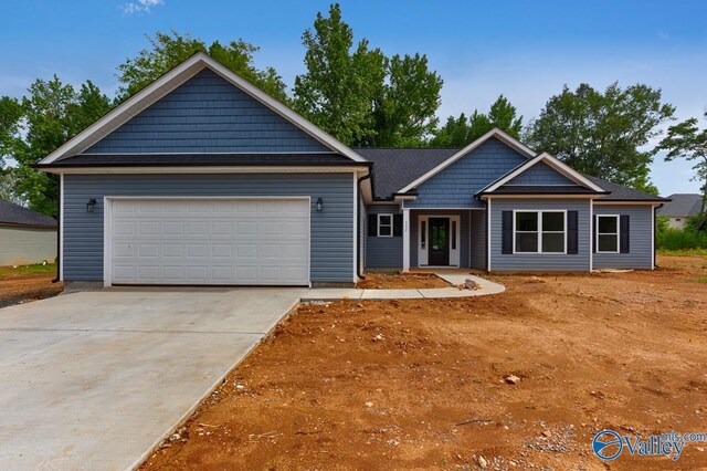 craftsman inspired home with a garage